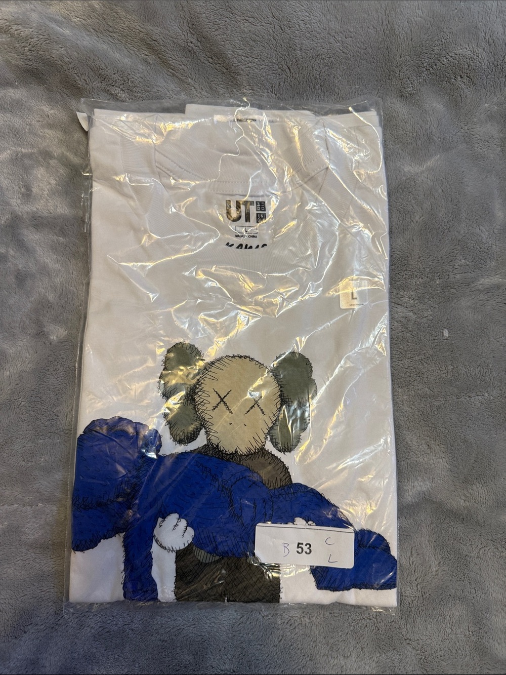 Uniqlo x KAWS White Tee with Blue Elmo and Olive Print